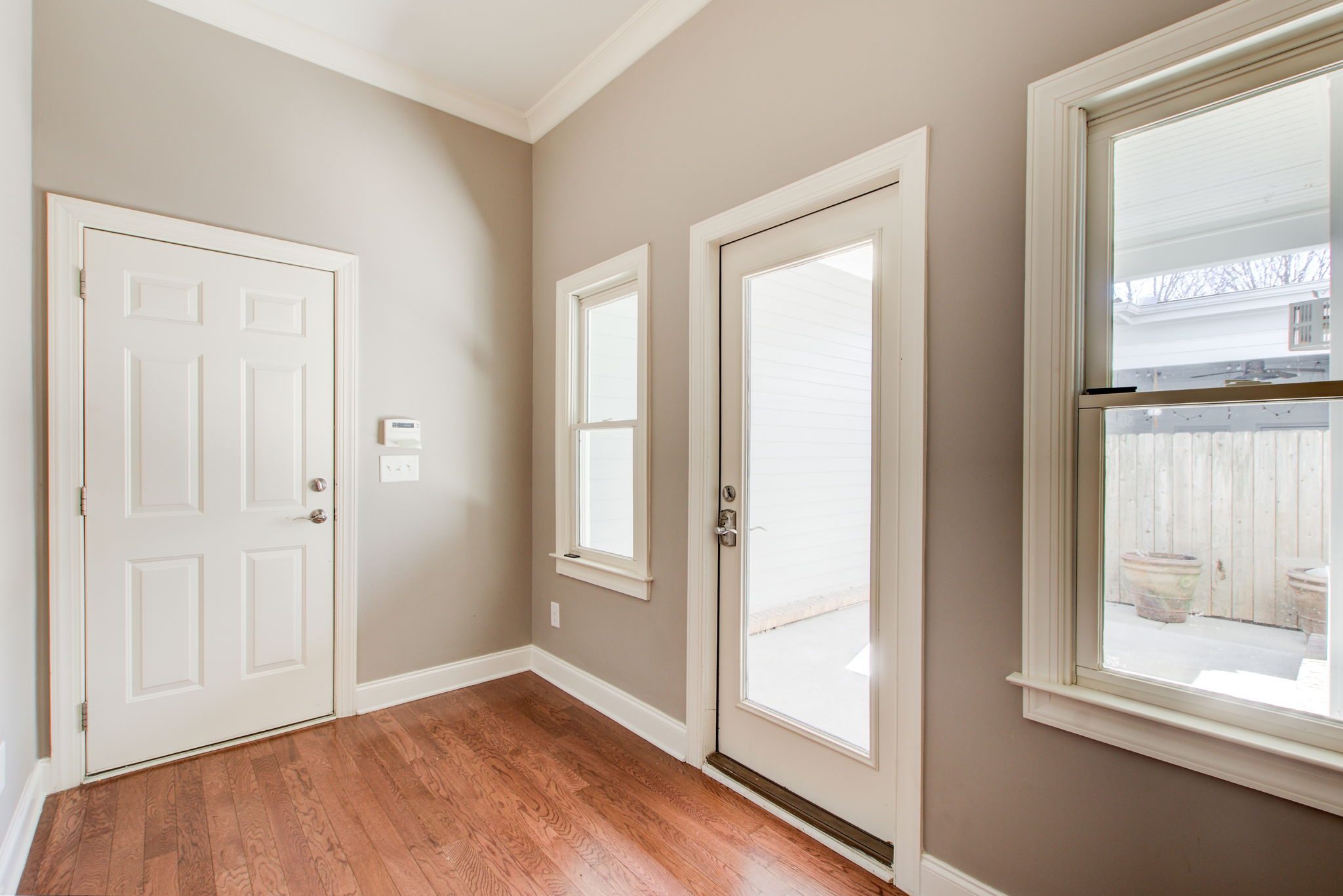 12 Mud Area w Garage Access + Patio Walkout