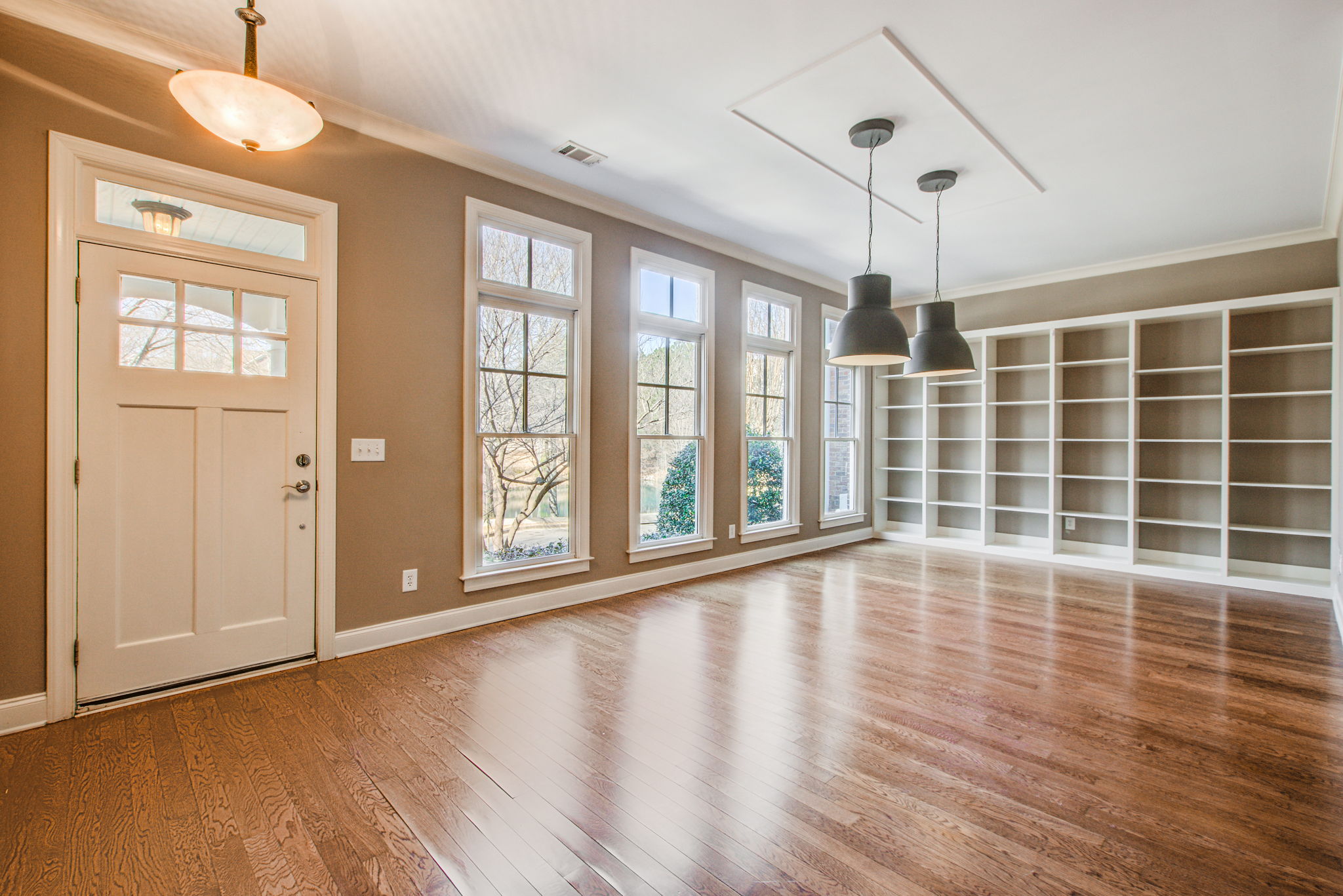 5 Formal Living Room B w Entry + Built In Shelving