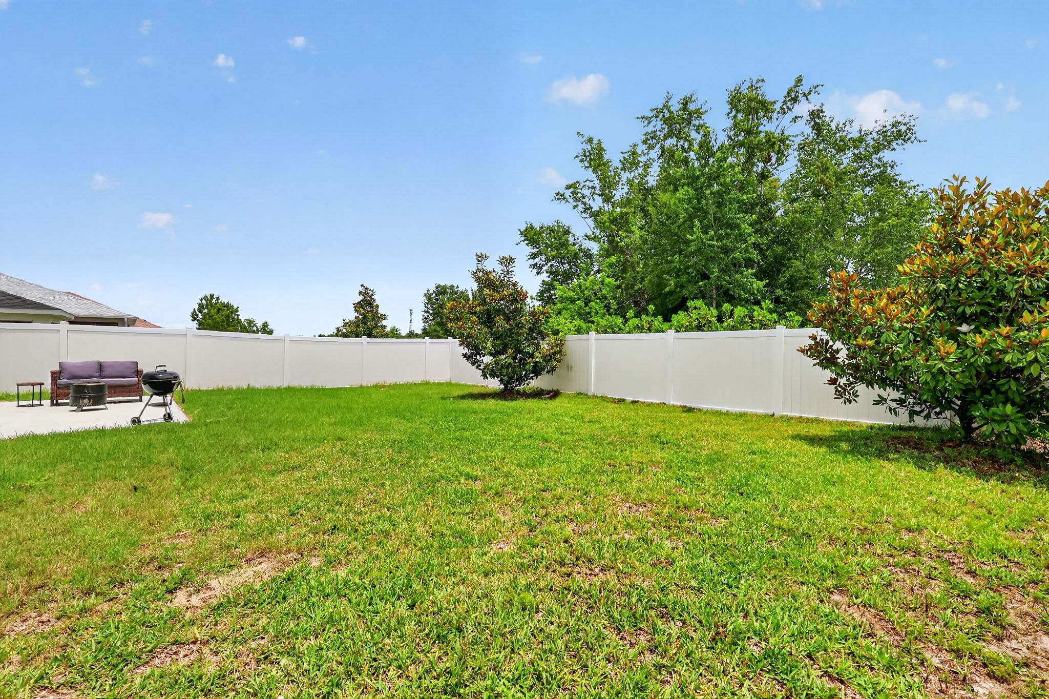 Rear Patio with Large Fenced Yard and Room For a Pool!