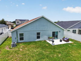 Rear Elevation with Patio, Large Fenced Yard, and Room For a Pool