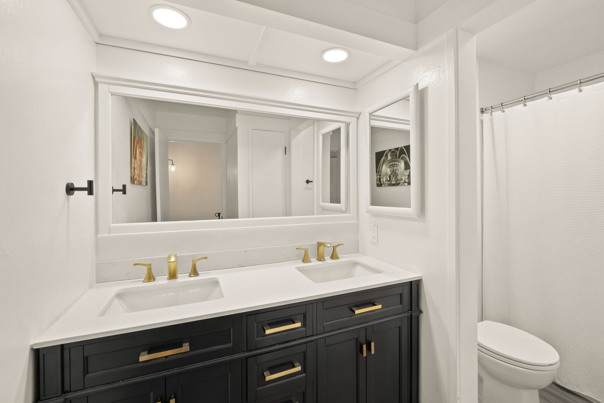 Updated Bath had Modern Vanity w/ Gold touches + Dual Sinks  + recessed lighting