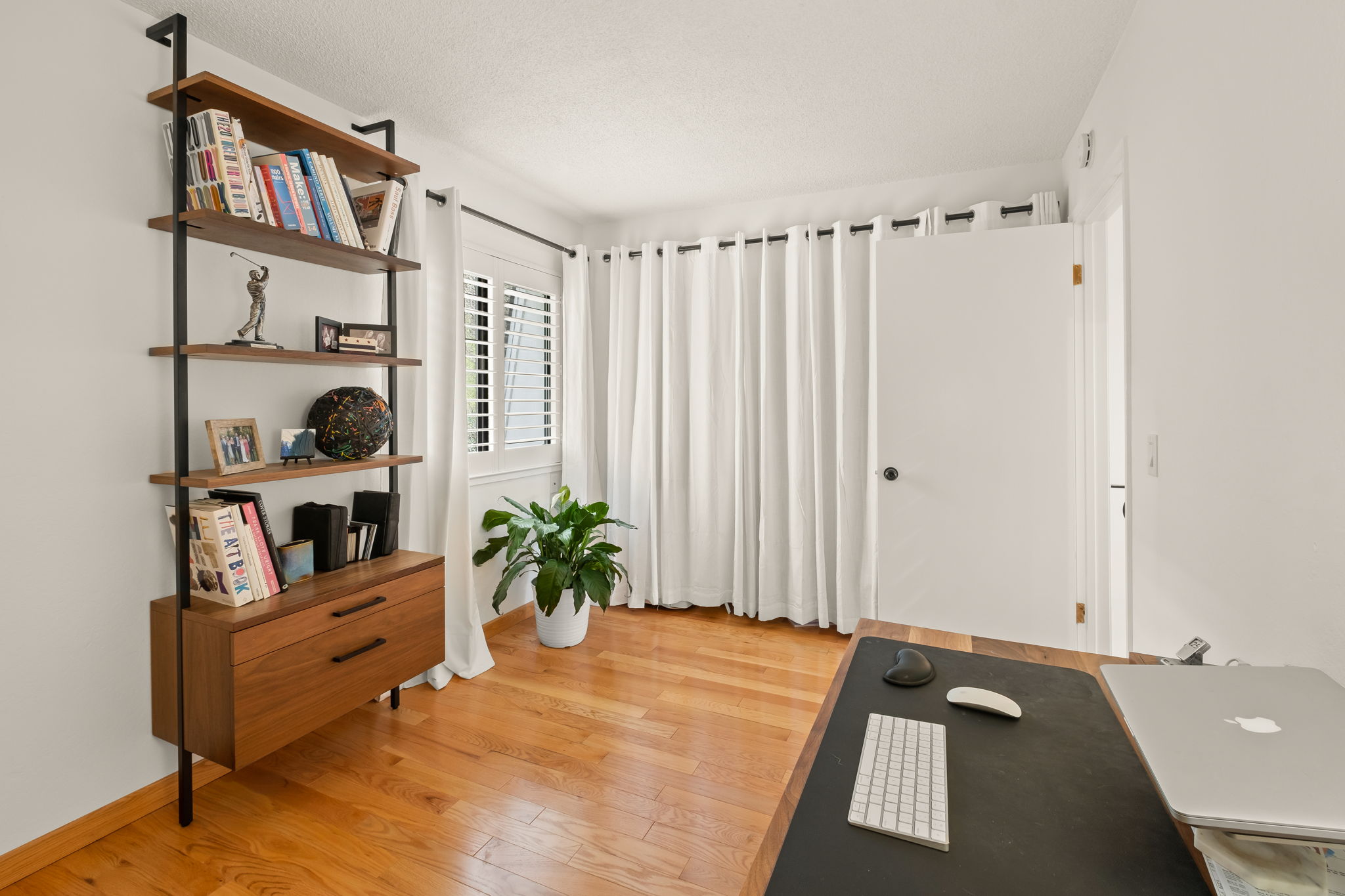 2nd Bedroom (staged as Office) has a BIG Deep Organized Close beautiful green Hillside Views