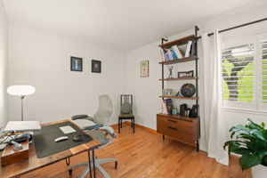 2nd Bedroom (staged as Office) has beautiful green Hillside Views
