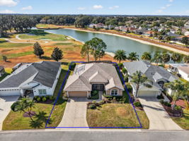 Aerial Front Elevation with Property Lines and Spectacular Water and Golf Front Views!