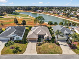 Aerial Front Elevation with Spectacular Water and Golf Front Views!
