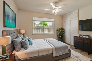 Bedroom 1 virtually staged.jpeg