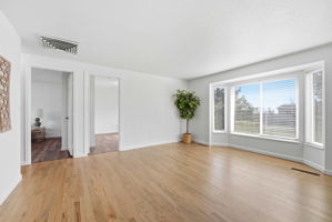Family Room w/ Bay Window and Hardwood