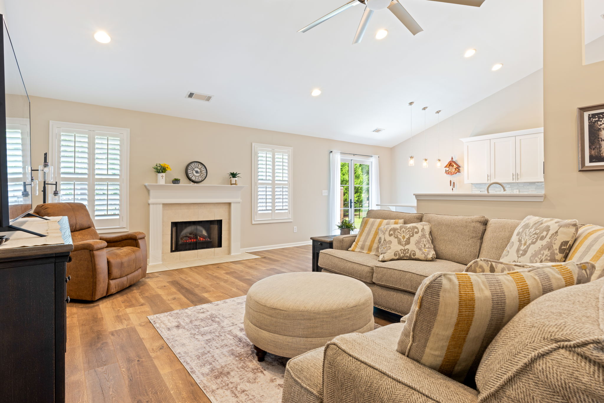Living room w/ wood burning fireplace
