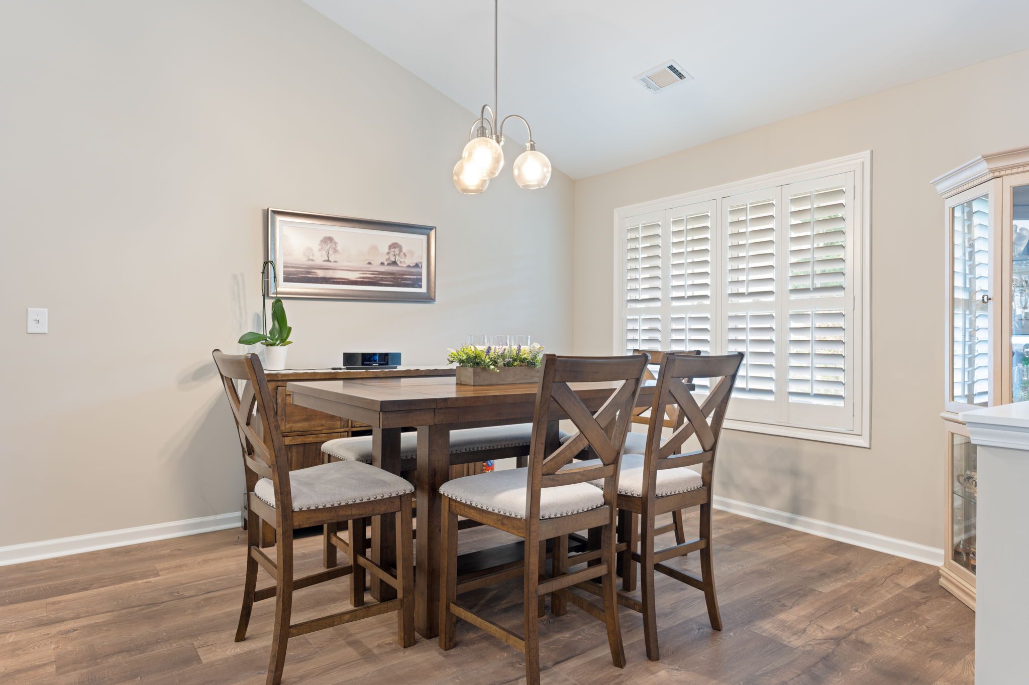 Oversized dining area w/ plantation shutters