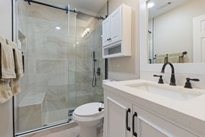 Bathroom #2 with upgraded tile shower & new vanity