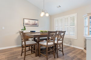Oversized dining area w/ plantation shutters