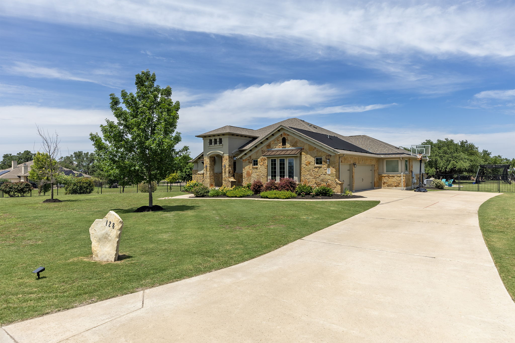 Loooonnnngggg driveway leading to your 3-car garage.