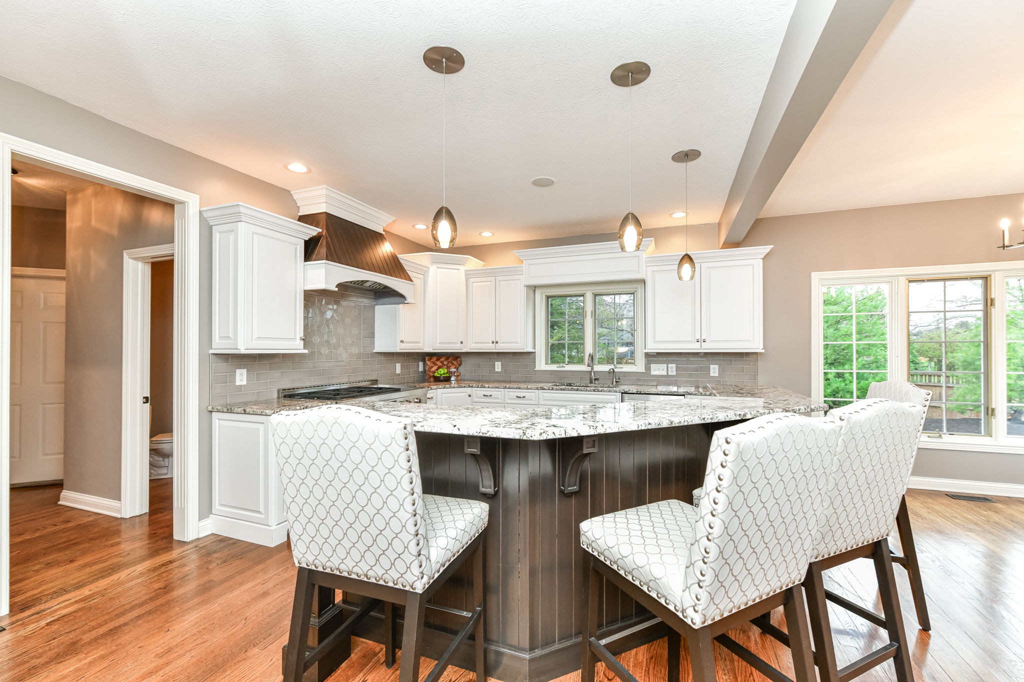 Upgraded Gourmet Kitchen with upgraded appliances and cabinets, center island and large walk-in pantry