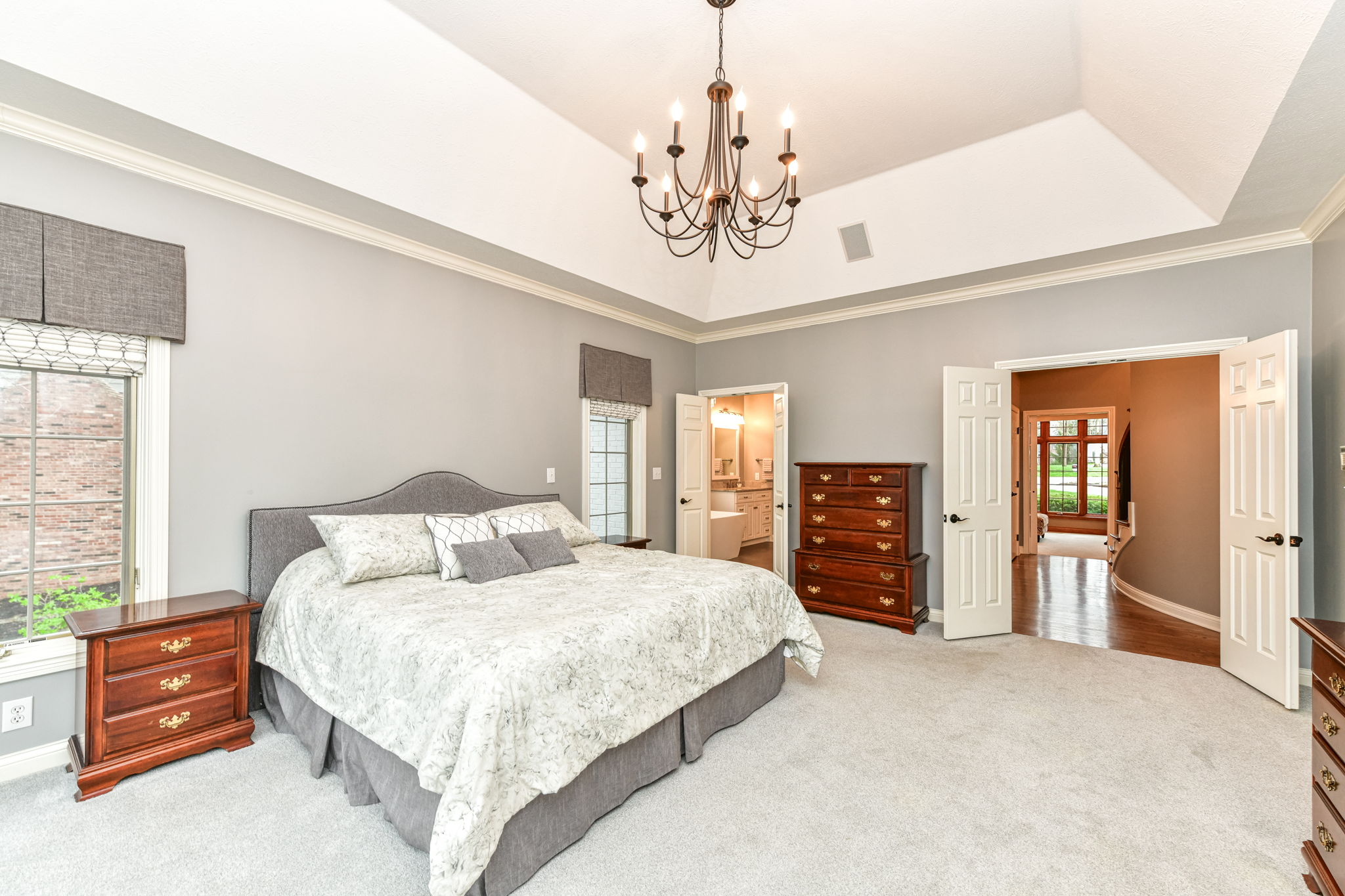Spacious Main Level Primary Bedroom Ensuite with Cozy Fireplace