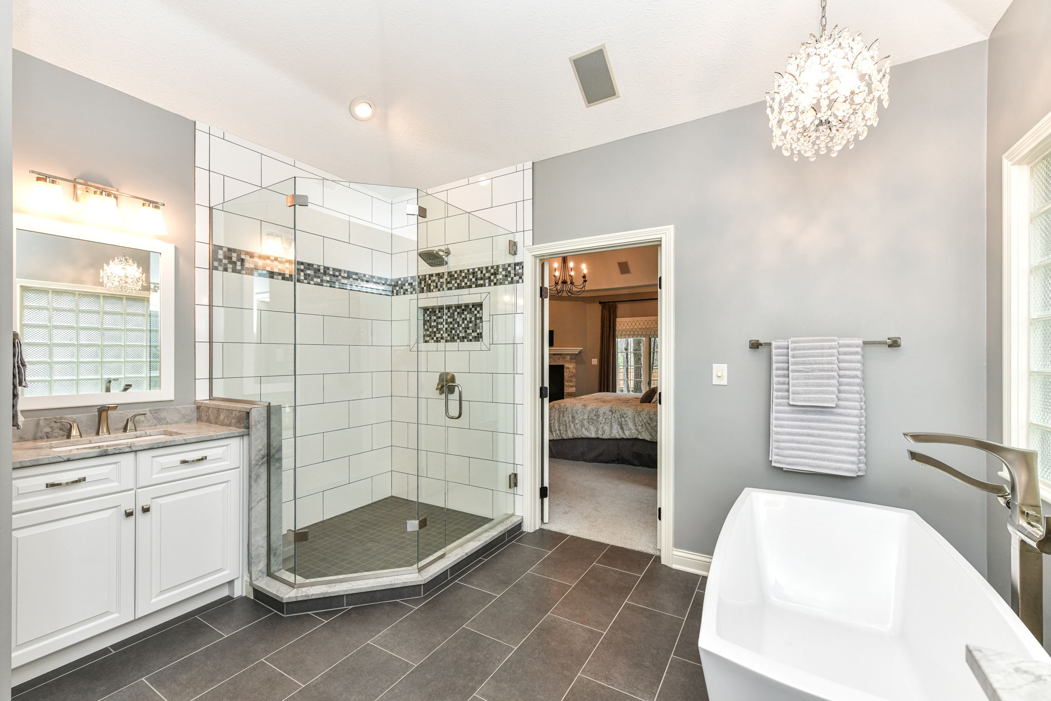 Spa-like Primary Bathroom with Beautiful Tile Floors and Large Walk-in Shower