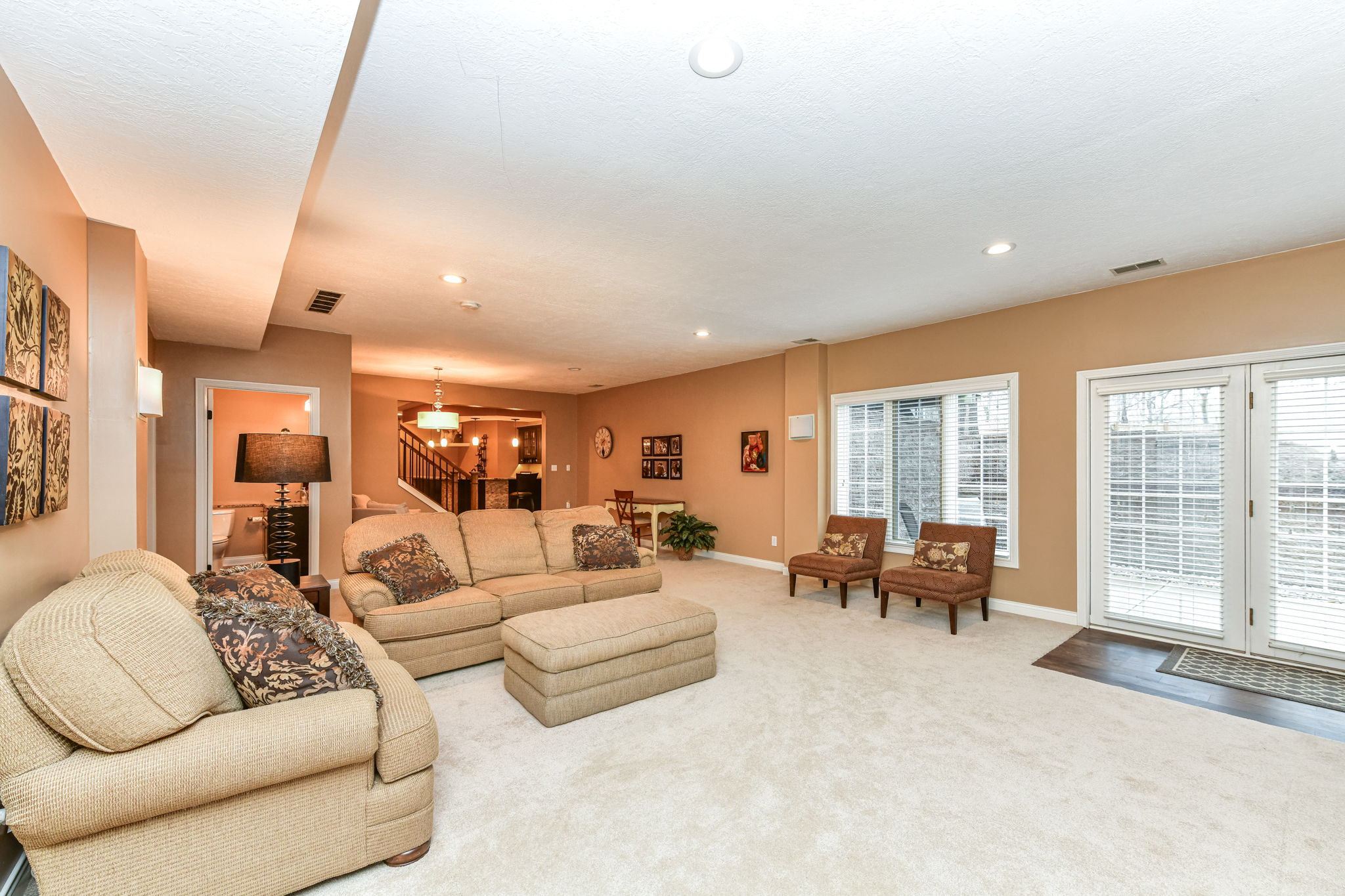 Huge Family Room in the Walk-out Lower Level with Custom Entertainment Center