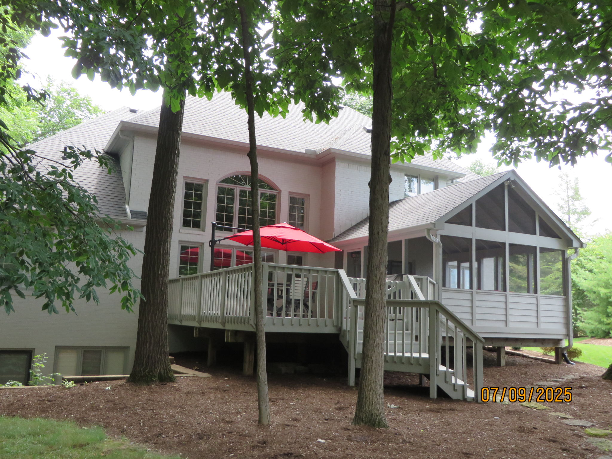Exterior photo from 2025 showing leaves in full bloom
