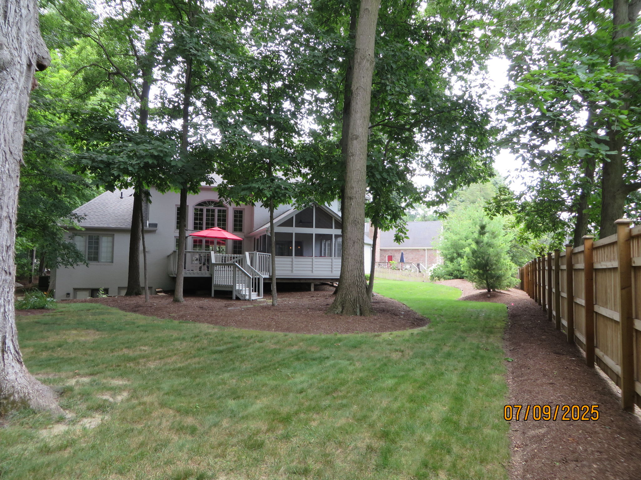 Exterior photo from 2025 showing leaves in full bloom