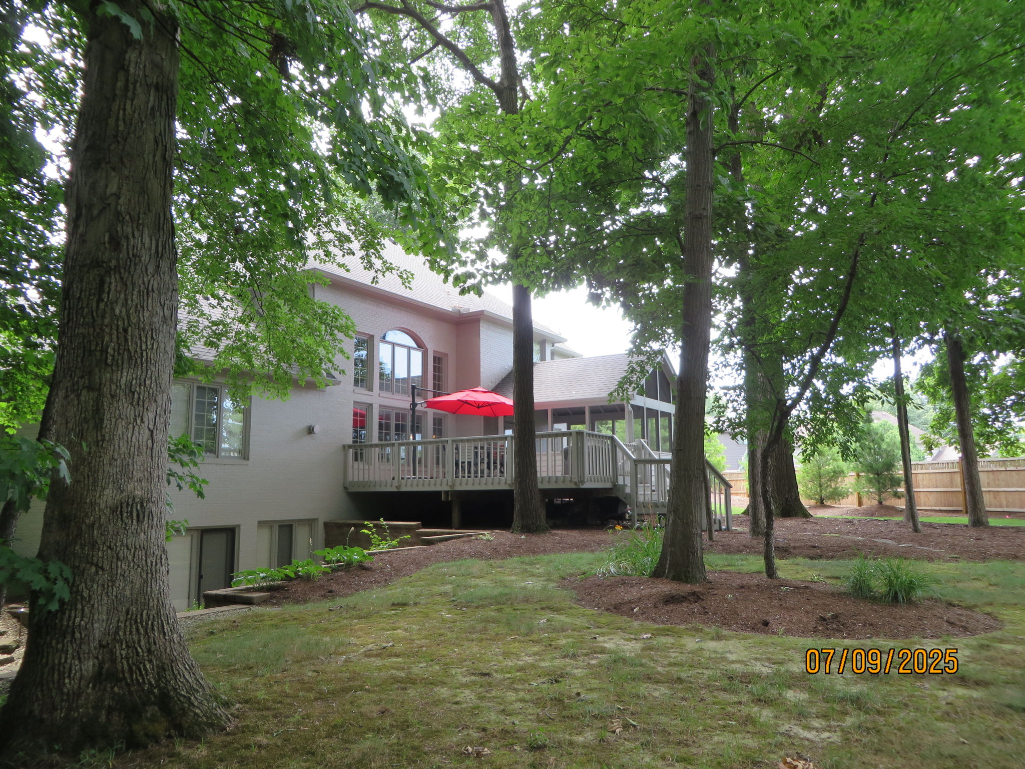 Exterior photo from 2025 showing leaves in full bloom