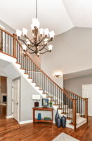 Impressive Entryway with Upgraded Stairway leading upstairs