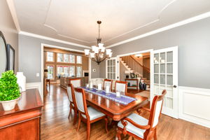 Dining Room with Crown Molding and Wainscoting