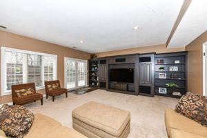 Huge Family Room in the Walk-out Lower Level with Custom Entertainment Center