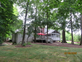 Exterior photo from 2025 showing leaves in full bloom