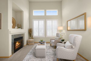 Spacious living room w/vaulted ceiling & cozy fireplace