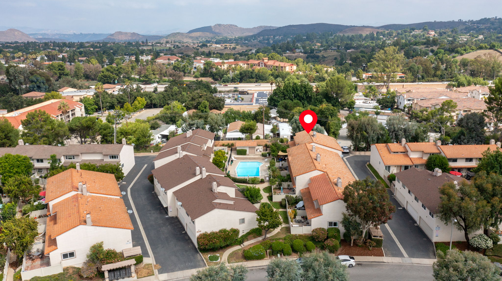 Aerial view looking north over unit and community