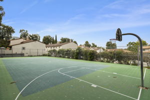 Community's basketball/sport court is adjacent to the tennnis court, main pool and spa area, clubhouse