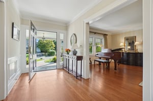 Step inside and exhale-the city fades, and home begins. This welcoming entry hall sets the tone for suburban living at its best: peaceful, connected, and beautifully yours at the end of every commute.