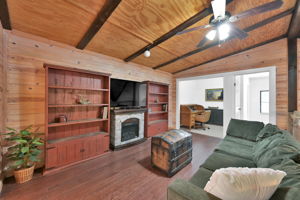 2nd Floor GAME ROOM / LOFT / SITTING AREA with another electric fireplace to enjoy throughout the year.