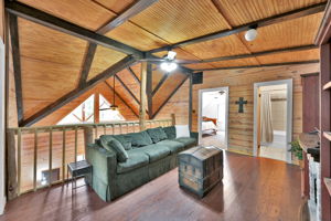 Another view of the upstairs (looking back towards the front entry). Love those dark beams!