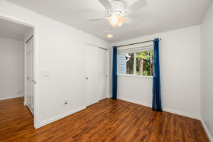 2nd upstairs bedroom w/ceiling fan.