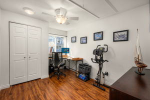 3rd upstairs bedroom or office w/ladder access to lighted & floored attic for extra storage.