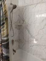 New shower w/marble shelves & SS faucets.