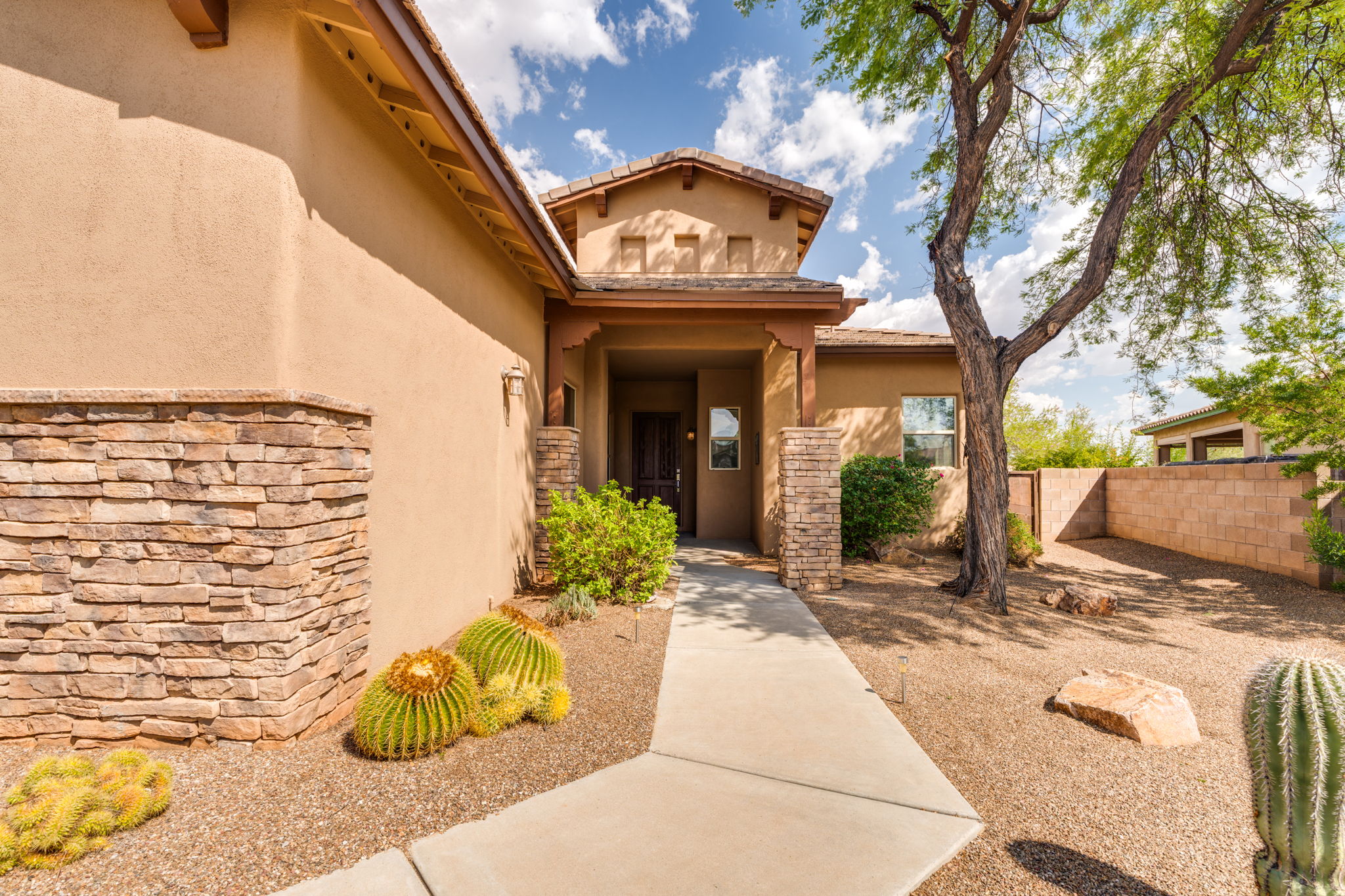 Walkway leading to the front entry veranda