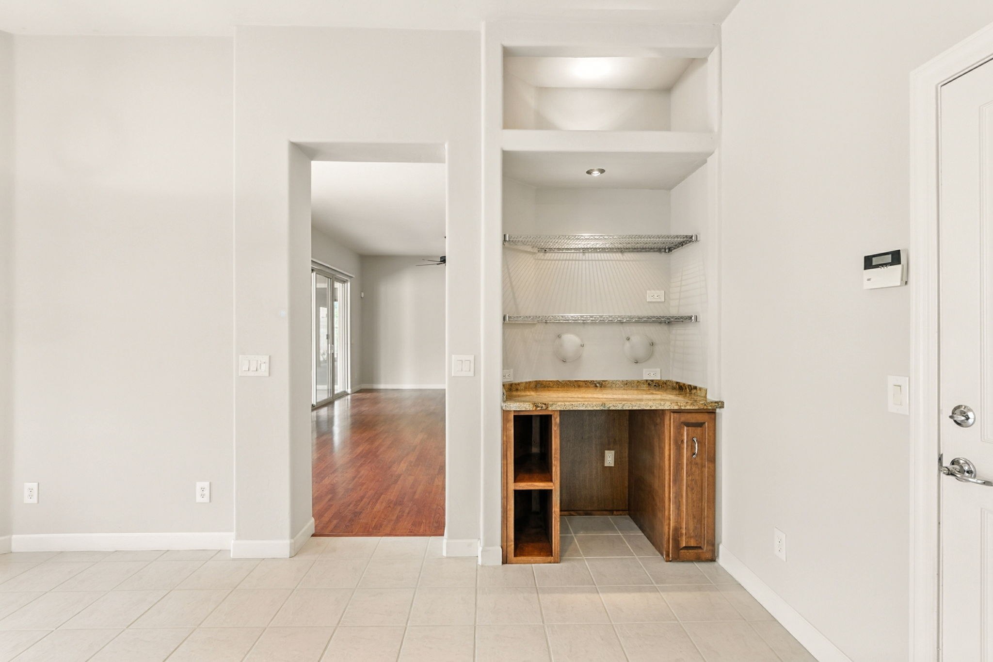The kitchen also features a dry bar that can accomidate a wine fridge