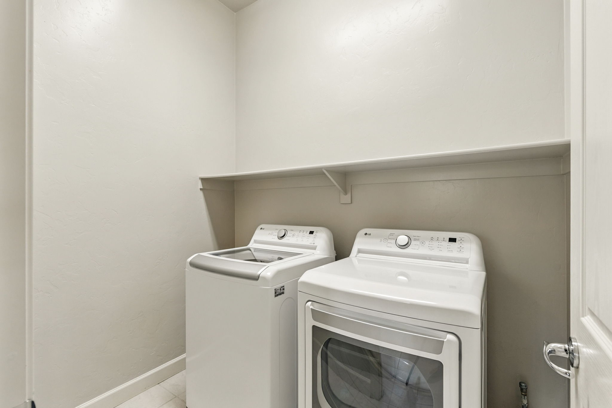 Laundry Room with full-size washer and dryer