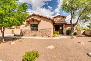 This beautiful home combines thoughtful design, quality block construction, and serene desert living. Recent updates that add long-term value include an Owned Solar System, Tankless Water Heater (2022),  Water Filtration System (2022),  New Roof (2021), and HVAC System (2018)