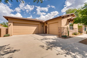 Attached three-car garage (two-car bay and a seperate one-car bay)