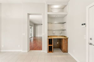 The kitchen also features a dry bar that can accomidate a wine fridge