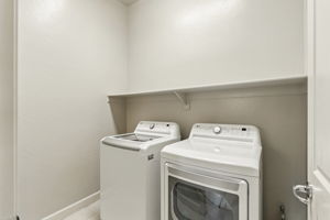 Laundry Room with full-size washer and dryer