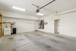 The attached two-car garage connects directly to the kitchen for convenience