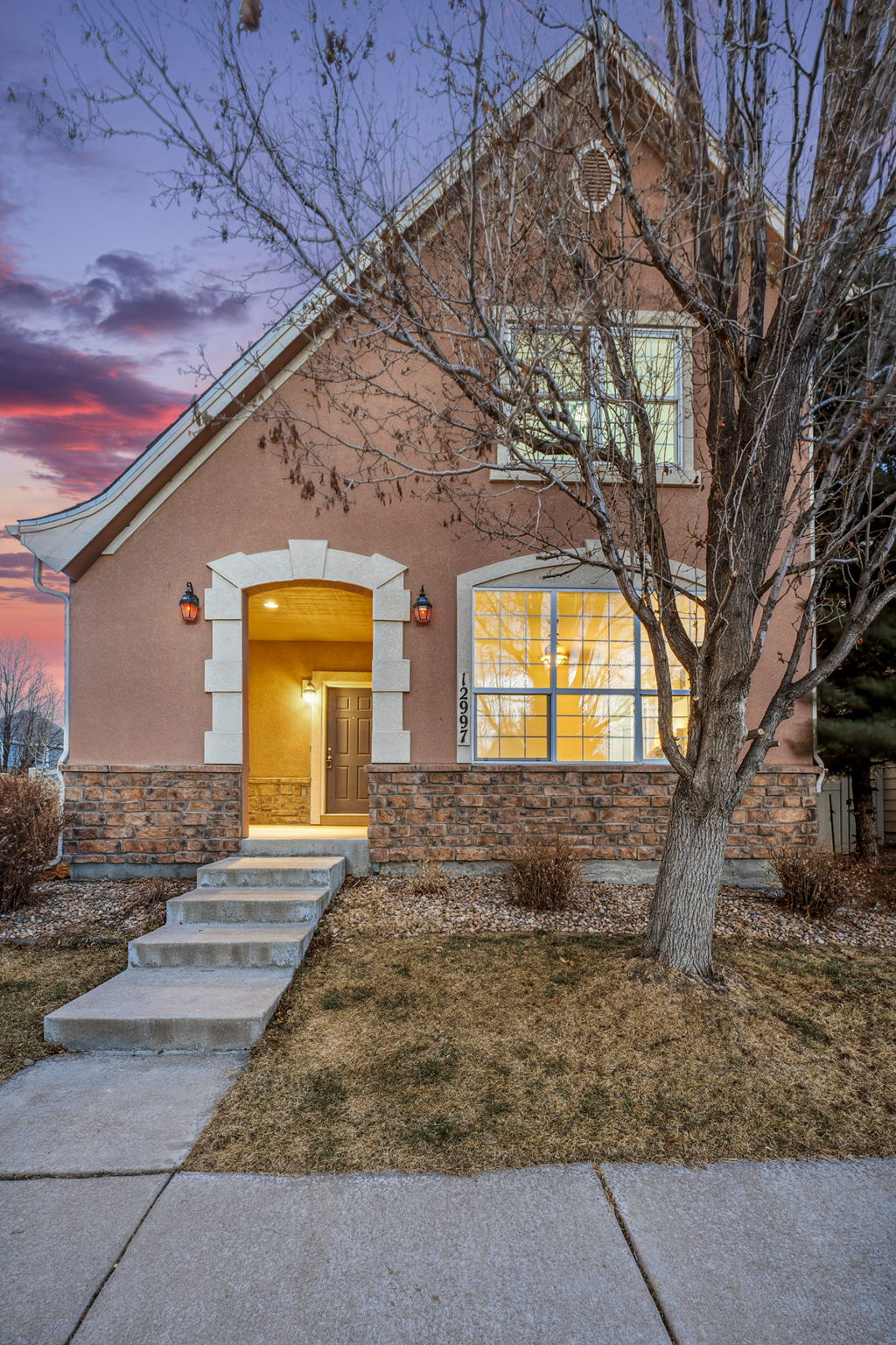 Front of the home at twilight