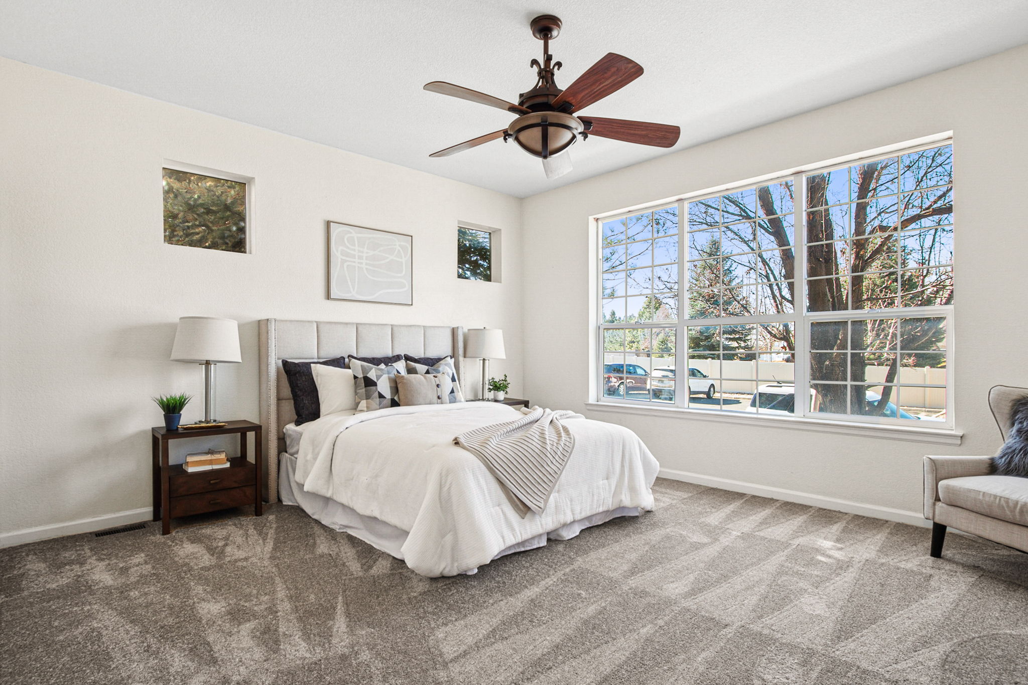 Light-filled main floor primary bedroom