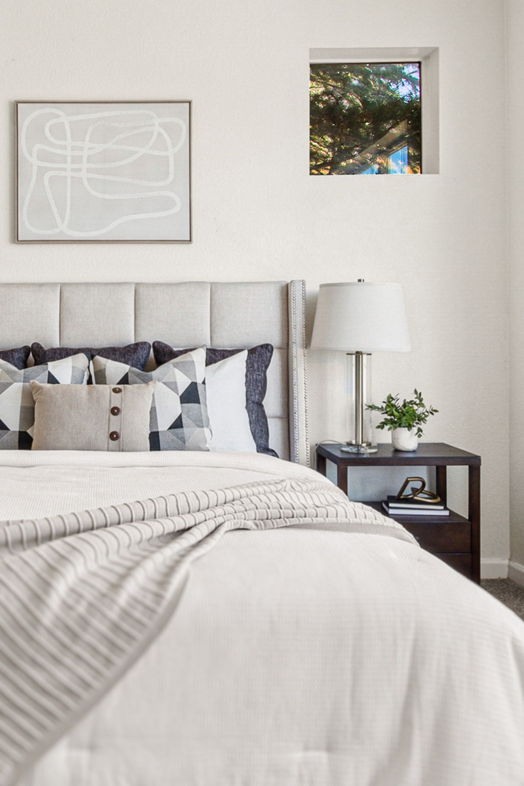 Light-filled main floor primary bedroom