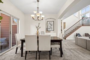 Spacious formal dining room adjacent to outdoor entertaining space