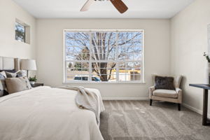 Light-filled main floor primary bedroom