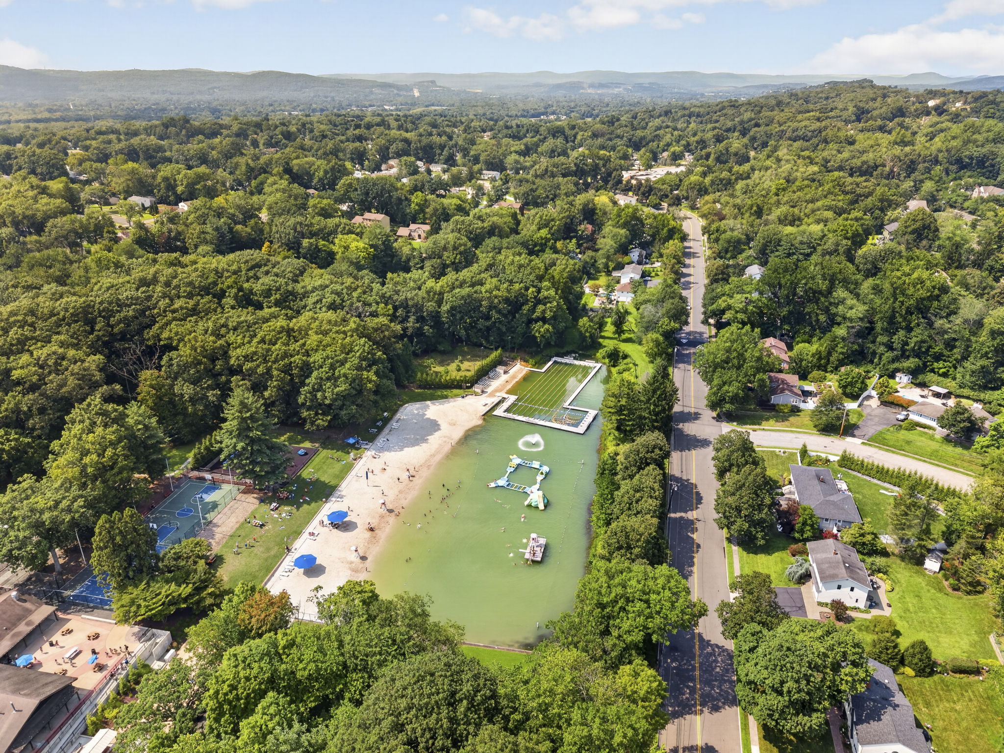 Nearby Michael Kilroy Park w playground, basketball courts, lake, obstacle course, swim lanes and more